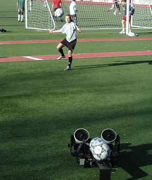 Pro Trainer soccer ball machine in action